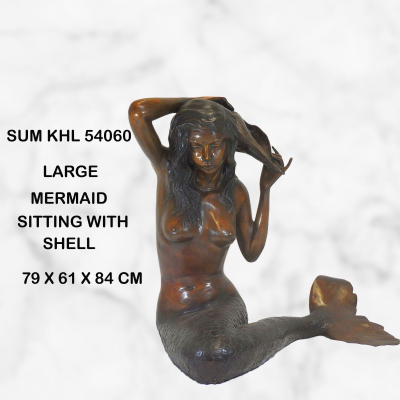 Mermaid holding shell water feature