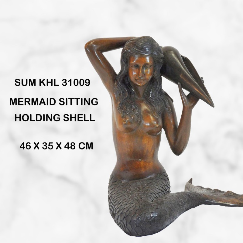 Mermaid with a shell water feature