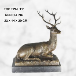 Deer lying statue