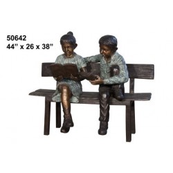 BOY AND GIRL ON BENCH STATUE